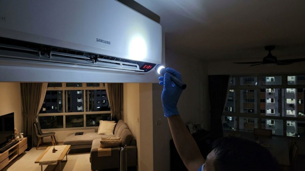 Samsung aircon indoor unit displaying an error code in a Singapore HDB flat
